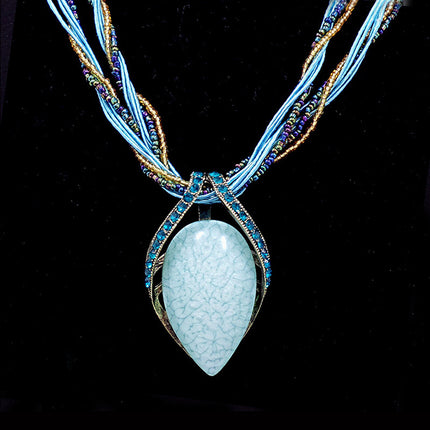 European and American ethnic style imitation beeswax color shell long sweater chain autumn and winter retro water drop necklace jewelry wholesale