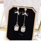 silver bowknot cat's eye stone [silver needle]]