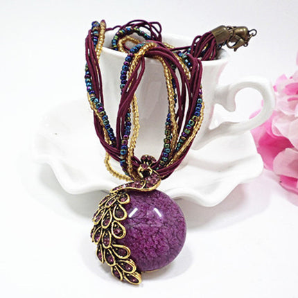 European and American ethnic style imitation beeswax color shell long sweater chain autumn and winter retro water drop necklace jewelry wholesale