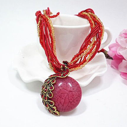 European and American ethnic style imitation beeswax color shell long sweater chain autumn and winter retro water drop necklace jewelry wholesale