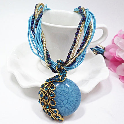 European and American ethnic style imitation beeswax color shell long sweater chain autumn and winter retro water drop necklace jewelry wholesale