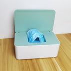 White box with green lid