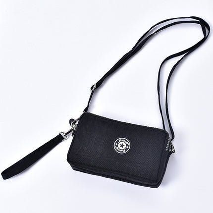 Mobile phone coin purse hand-held mini canvas bag women's bag Oxford cloth cartoon fabric bag wholesale