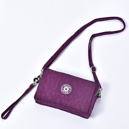 Mobile phone coin purse hand-held mini canvas bag women's bag Oxford cloth cartoon fabric bag wholesale