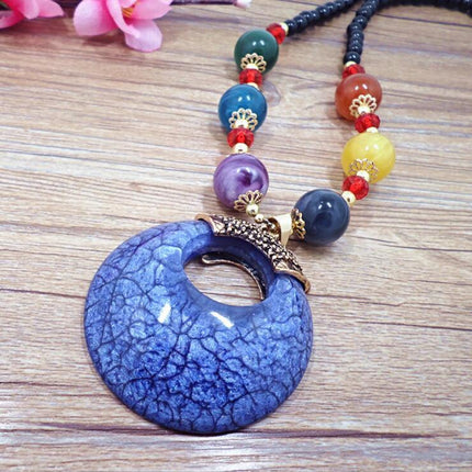 European and American ethnic style imitation beeswax color shell long sweater chain autumn and winter retro water drop necklace jewelry wholesale