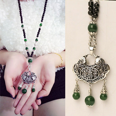 European and American ethnic style imitation beeswax color shell long sweater chain autumn and winter retro water drop necklace jewelry wholesale