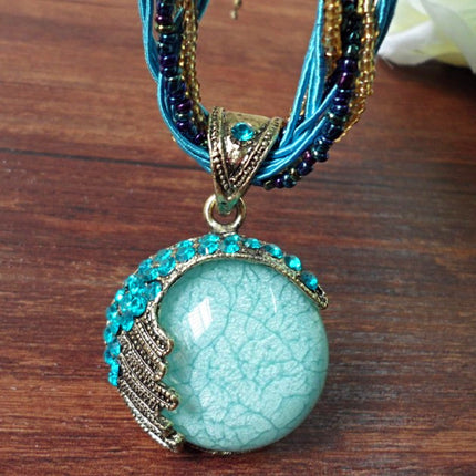 European and American ethnic style imitation beeswax color shell long sweater chain autumn and winter retro water drop necklace jewelry wholesale