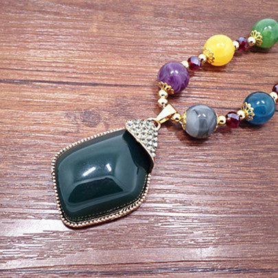 European and American ethnic style imitation beeswax color shell long sweater chain autumn and winter retro water drop necklace jewelry wholesale