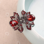 Gun black lotus petals Red