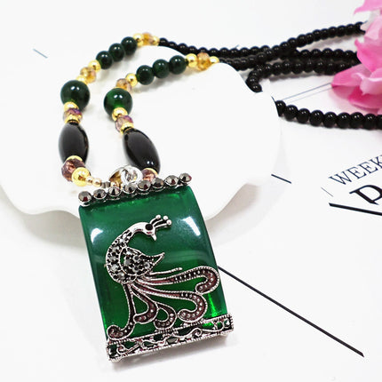 European and American ethnic style imitation beeswax color shell long sweater chain autumn and winter retro water drop necklace jewelry wholesale