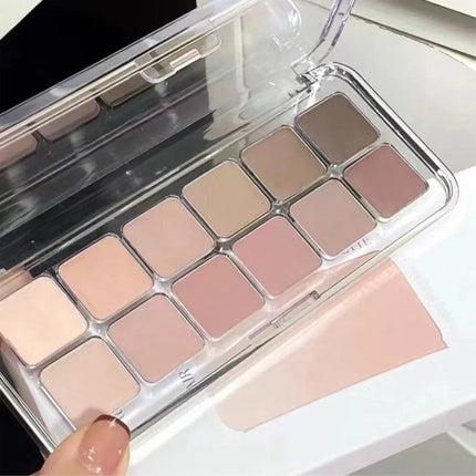 12-color eyeshadow palette with earth-toned shimmer and matte finish suitable for daily use