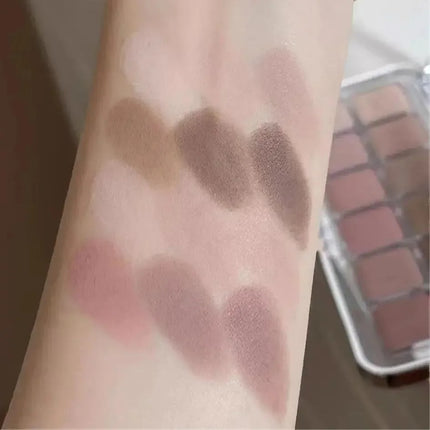 12-color eyeshadow palette with earth-toned shimmer and matte finish suitable for daily use