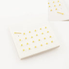 24 gold beads