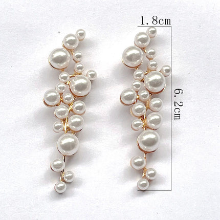 Europe and the United States cross-border trade imitation pearl earrings alloy geometric diamond pearl personality Joker accessories wholesale earrings