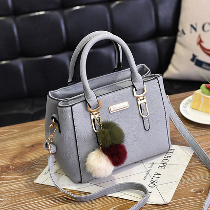 Small square bag ladies handbag simple shoulder bag large capacity bag double fur ball messenger bag wholesale cross-border