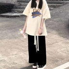 Black pants + apricot top / XS
