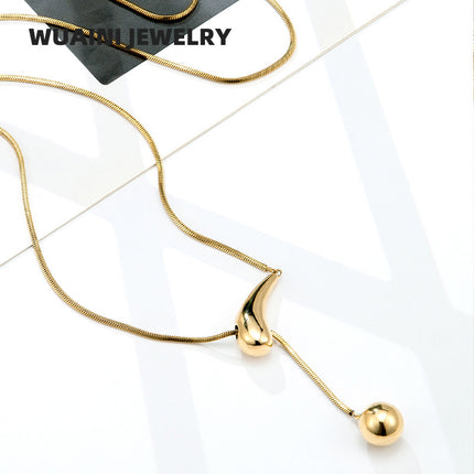 Creative drawstring water drop ball necklace titanium steel electroplating 18K gold high-grade sweater chain women's simple pendant wholesale