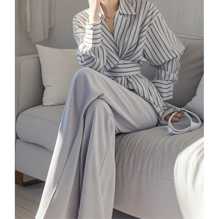 In spring, wear a set of salt-based, light-cooked and capable, elegant, A- and-gray striped shirt, professional suit pants