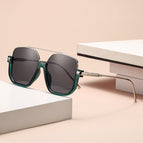 Green silver frame black and gray film