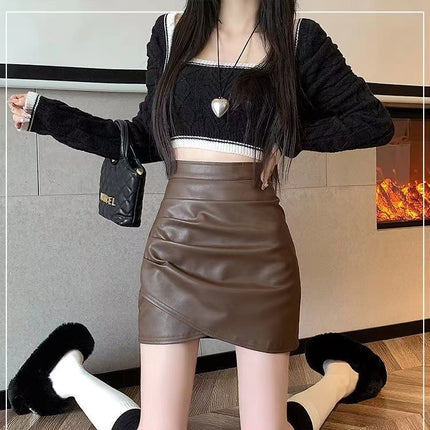 Black pu leather skirt skirt women's autumn and winter 2025 new high waist slimming irregular pleated hip skirt