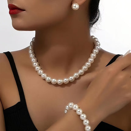 A set of cold wind imitation pearl earrings bracelet necklace suit female niche temperament retro clavicle chain suit wholesale