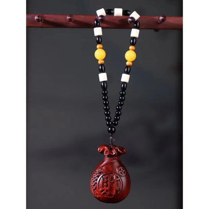 Lobular red sandalwood wood carving handle piece fortune pendant brave play piece text wealth pendant wood text play crafts