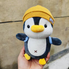 25cm / Yellow hat traveling penguin