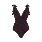 Colorful bikini on black background / S