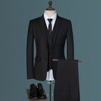Black three-piece suit / M