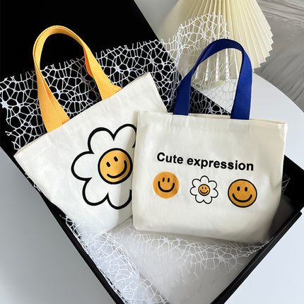 2024 New Cute Smiley Flower Outgoing Fashion All-match Summer Eco-friendly Canvas Lunch Handbag