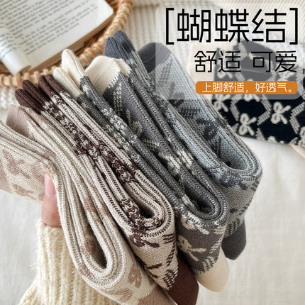 Zhuji socks women's autumn and winter retro trend women's socks bow printed socks warm cold-resistant pile socks wholesale