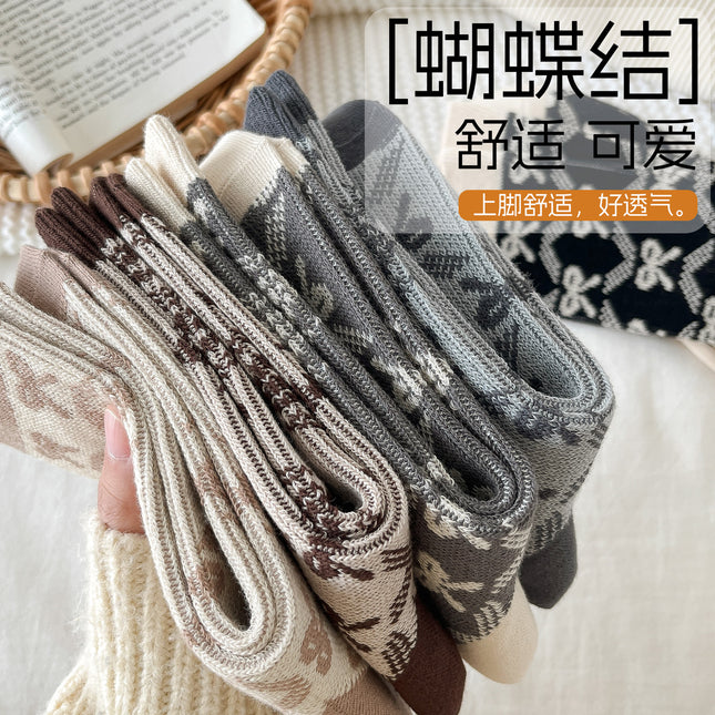 Zhuji socks women's autumn and winter retro trend women's socks bow printed socks warm cold-resistant pile socks wholesale