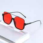 Black frame, red lens
