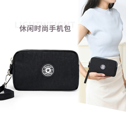 Mobile phone coin purse hand-held mini canvas bag women's bag Oxford cloth cartoon fabric bag wholesale