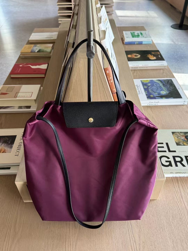 2025 New Waterproof Cloth with Head Layer Cowhide Bucket Bag Large Capacity Portable Shoulder Bag Commuter Crossbody Computer Bag