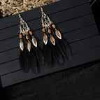 Black feather earrings