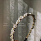 Two large and two small pearls black gold models