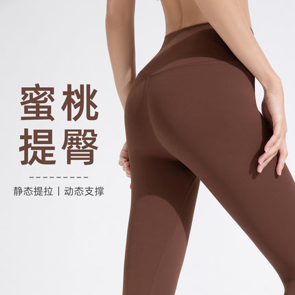 No embarrassment line double-sided brushed nude yoga pants Women's European and American high waist hip lifting Peach Hip sports fitness pants