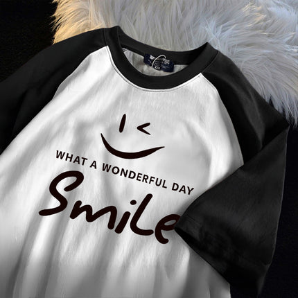 New top girls' contrast color design color matching loose short sleeve black and white color separation smiley face printed casual T-shirt women's clothing
