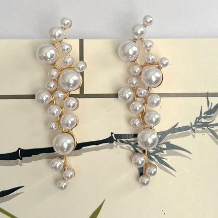 Europe and the United States cross-border trade imitation pearl earrings alloy geometric diamond pearl personality Joker accessories wholesale earrings