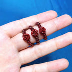 Pomegranate + rose ring