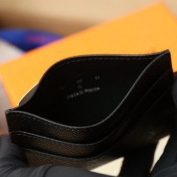 L's Card Holder M62170 Is Compact and Can Easily Fit into Your Pocket. It Comes with a Central Pocket and Four Slots