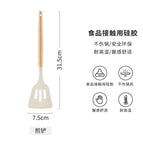 Frying spatula with wooden handle