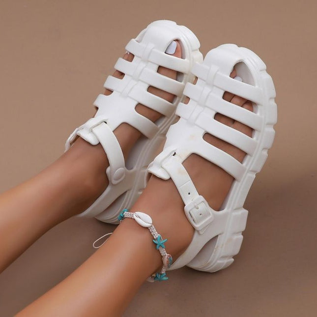 Thick-soled gear sandals women's shoes pig cage shoes covered toe hollow woven muffin Roman sandals plus size ins style sandals