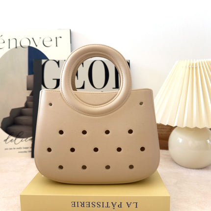 Cross-border new ladies handbag cartoon love fashion round travel storage bag eva hole bag beach bag