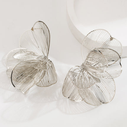 Korean creative alloy hollow flower earrings sweet exaggerated design earrings simple fashion cold wind earrings