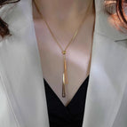 Gold triangular titanium steel necklace