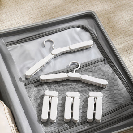 Folding hanger multifunctional clothes hanger portable clothes hanger non-slip thick seamless travel hanger with clip wholesale