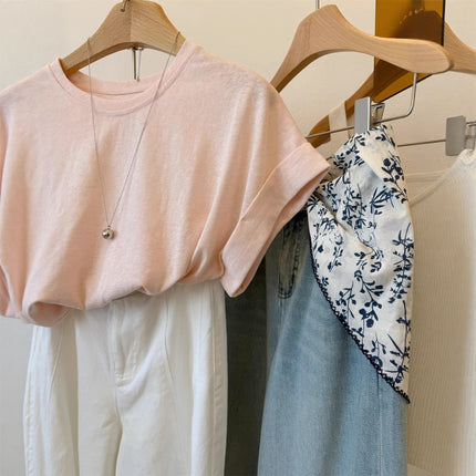 Muyang Recommends It! Minimalist, Relaxed Style Short-Sleeve T-Shirt for Women with Front Short and Back Long Design and Decorative Buttons on the Back