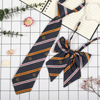 Dark blue and white M (tie collar flower)